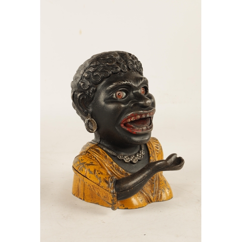 583 - AN EARLY 20TH CENTURY CAST IRON 'DINAH' MONEY BOX by John Harper & Co England, Registration No 58128... 