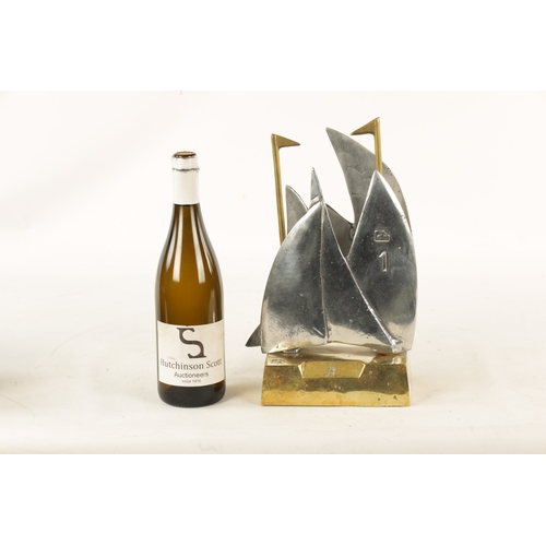 588 - A STYLISH BRONZE AND STEEL MARITIME SCULPTURE, possibly a racing trophy, modelled as sailing boats w... 
