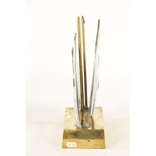 588 - A STYLISH BRONZE AND STEEL MARITIME SCULPTURE, possibly a racing trophy, modelled as sailing boats w... 