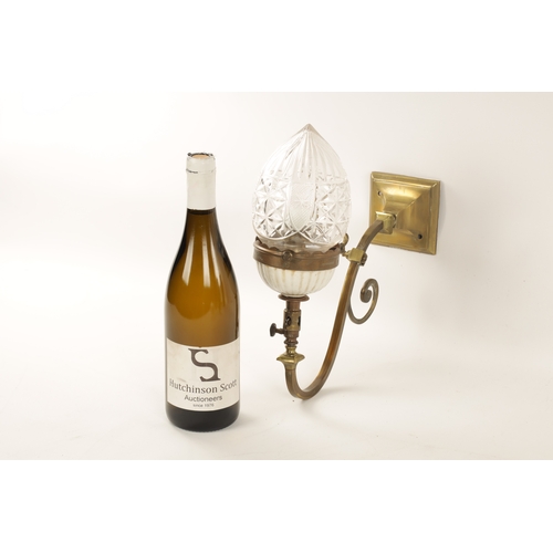 589 - A PAIR OF ELECTRIFIED BRASS WALL LIGHTS with scrolled arms and cut glass pendant shades on brass fit... 