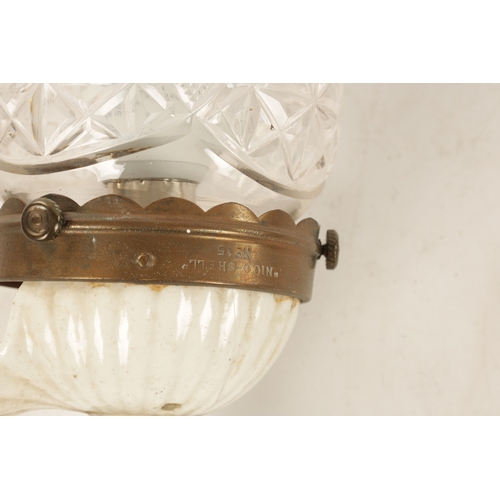 589 - A PAIR OF ELECTRIFIED BRASS WALL LIGHTS with scrolled arms and cut glass pendant shades on brass fit... 