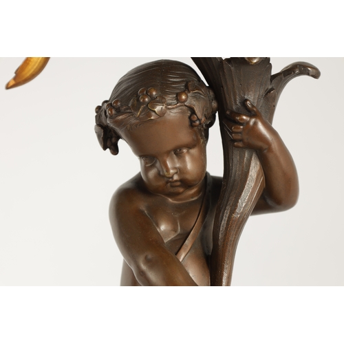 591 - A PAIR OF 19TH CENTURY BRONZE AND ORMOLU SEVEN BRANCH CANDLELARBRA with leaf and flower head decorat... 
