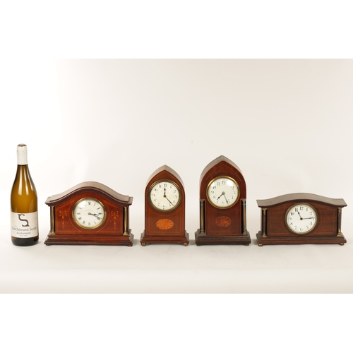 969 - A COLLECTION OF FOUR EDWARDIAN INLAID MANTEL CLOCKS all in mahogany cases with French eight day spri... 