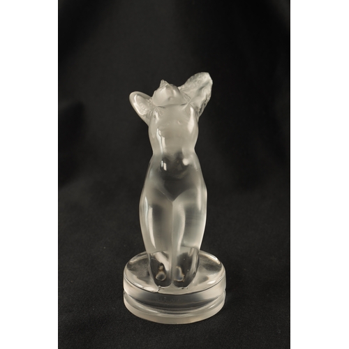 1 - A RENE LALIQUE 'CHRYSIS' CLEAR GLASS CAR MASCOT mounted on a bevelled circular base etched to the fr... 