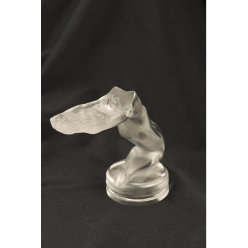 1 - A RENE LALIQUE 'CHRYSIS' CLEAR GLASS CAR MASCOT mounted on a bevelled circular base etched to the fr... 