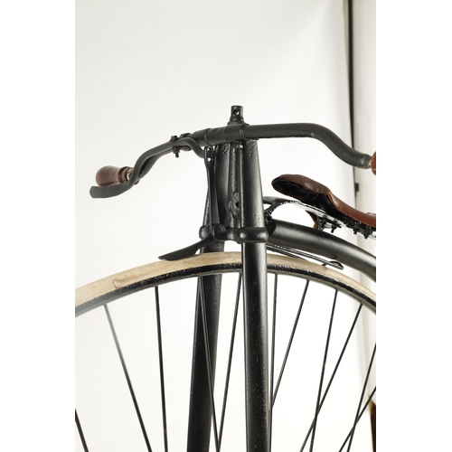 100 - A LATE 19TH CENTURY PENNY FARTHING BICYCLE WITH 52” WHEEL having painted frame and brown saddle seat... 