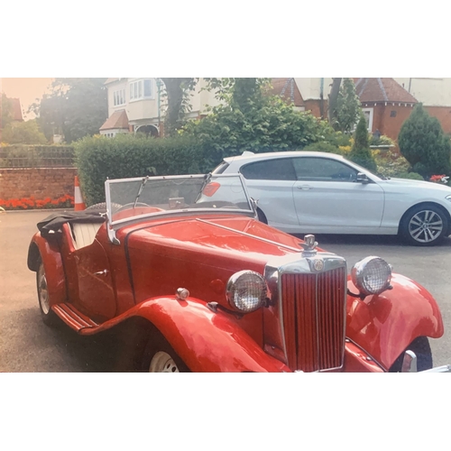 112 - A 1951 MG TD COMPETITION MODEL Finished in red, this MG is described by the vendor as in good condit... 