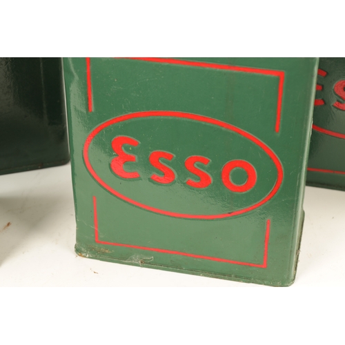 15 - A COLLECTION OF FOUR VINTAGE PETROL CANS two by 'PRATTS' and two by 'ESSO'. (25cm by 28cm by 15cm )