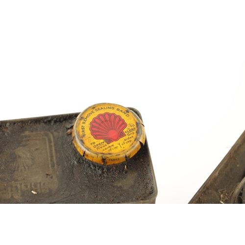 17 - AN EARLY SHELL MOTOR GREASE CAN AND MOTOR OIL CAN with some of the original contents (17.5cm high)