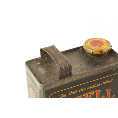 17 - AN EARLY SHELL MOTOR GREASE CAN AND MOTOR OIL CAN with some of the original contents (17.5cm high)