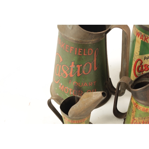 20 - A COLLECTION OF FIVE VINTAGE CASTROL OIL CANS of various sizes (Tallest is 23cm high)