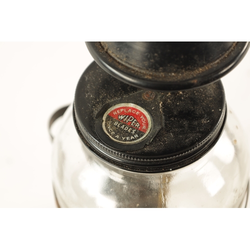 22 - A VINTAGE 'TRICO' AUTOMATIC WINDSCREEN WASHER BOTTLE with original labels and hardware. (6oz, 29cm h... 