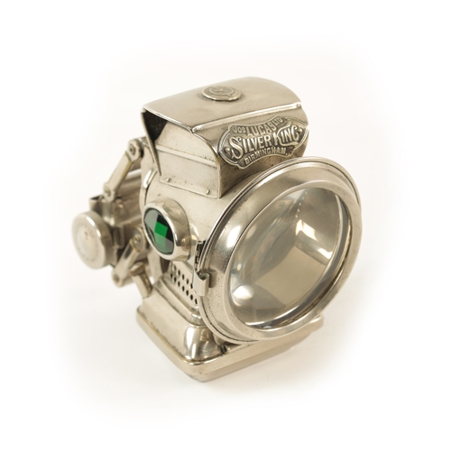 27 - A VINTAGE LUCAS SILVER KING BIRMINGHAM CYCLE LIGHT with clear lens and green-coloured glass side rep... 