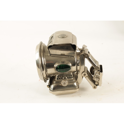 27 - A VINTAGE LUCAS SILVER KING BIRMINGHAM CYCLE LIGHT with clear lens and green-coloured glass side rep... 