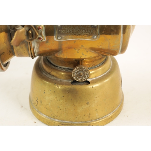 28 - A BRASS LUCAS 721 'KING OF THE ROAD' OIL SIDE LAMP with two-tier chimney and loop handle. (32cm high... 