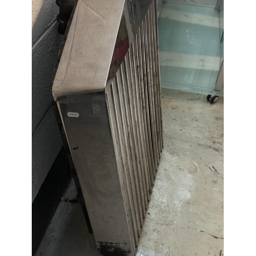 31 - A VINTAGE ROLLS ROYCE RADIATOR AND GRILL no. E.56831. (87cm high, 59cm wide)