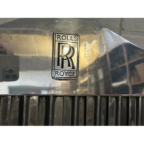 31 - A VINTAGE ROLLS ROYCE RADIATOR AND GRILL no. E.56831. (87cm high, 59cm wide)