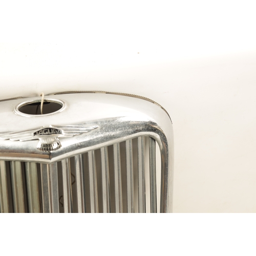 32 - A VINTAGE JAGUAR 3 1/2 LITRE CHROMED RADIATOR GRILL with black enamelled badges. (60cm wide, 68cm hi... 