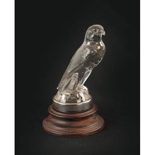 4 - A RENE LALIQUE 'FAUCON' CLEAR AND FROSTED GLASS CAR MASCOT mounted with a chrome circular collar on ... 