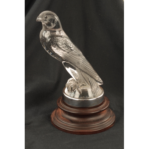 4 - A RENE LALIQUE 'FAUCON' CLEAR AND FROSTED GLASS CAR MASCOT mounted with a chrome circular collar on ... 