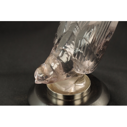 5 - A RENE LALIQUE 'HIRONDELLES' TINTED CLEAR GLASS CAR MASCOT mounted with a chrome collar on a chamfer... 