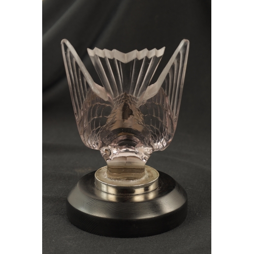 5 - A RENE LALIQUE 'HIRONDELLES' TINTED CLEAR GLASS CAR MASCOT mounted with a chrome collar on a chamfer... 