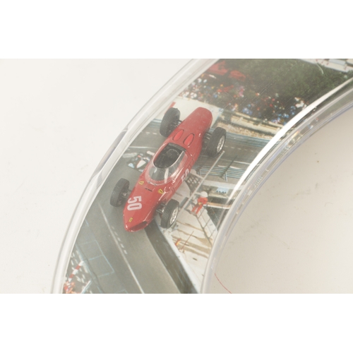 79 - A FERRARI-THEMED TOILET SEAT with Monaco backdrop containing 4 model Ferraris - bearing plaques 'ELI... 