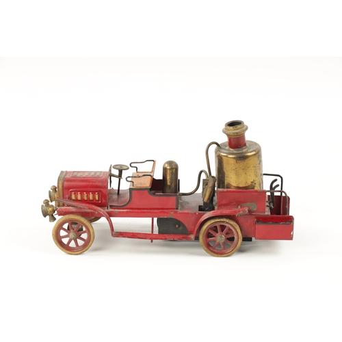 80a - A LATE 20TH CENTURY PRESSED STEEL MUSICAL FIRE 'PUMPER' ENGINE TOY MODEL painted with a red ground a... 