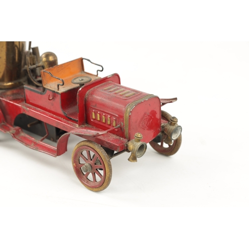 80a - A LATE 20TH CENTURY PRESSED STEEL MUSICAL FIRE 'PUMPER' ENGINE TOY MODEL painted with a red ground a... 