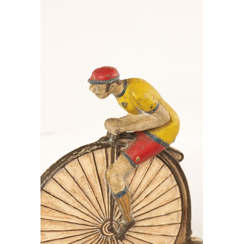 81 - A RARE 19TH CENTURY CAST IRON PAINTED DOORSTOP FORMED AS A CYCLIST MOUNTED ON A PENNY FARTHING decor... 