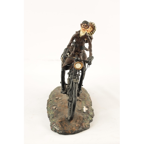 82 - A MODEL SCULPTURE OF A CLASSIC MOTORBIKE with rider and passenger (30cm wide 28cm high 15cm deep)