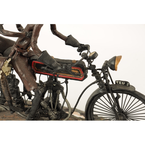 82 - A MODEL SCULPTURE OF A CLASSIC MOTORBIKE with rider and passenger (30cm wide 28cm high 15cm deep)