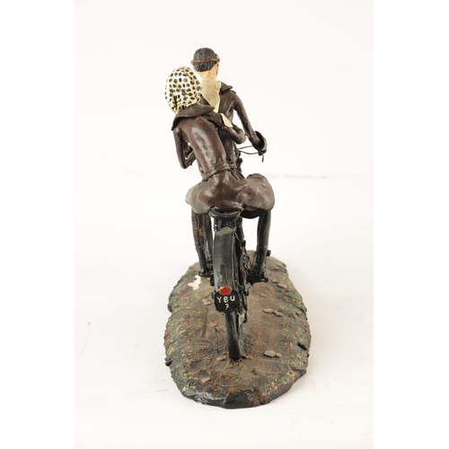 82 - A MODEL SCULPTURE OF A CLASSIC MOTORBIKE with rider and passenger (30cm wide 28cm high 15cm deep)