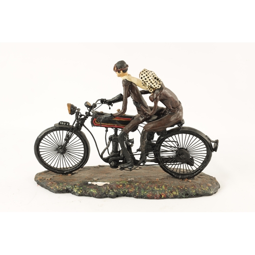 82 - A MODEL SCULPTURE OF A CLASSIC MOTORBIKE with rider and passenger (30cm wide 28cm high 15cm deep)