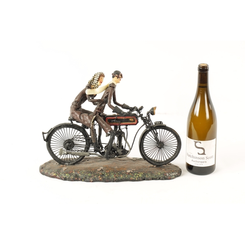 82 - A MODEL SCULPTURE OF A CLASSIC MOTORBIKE with rider and passenger (30cm wide 28cm high 15cm deep)