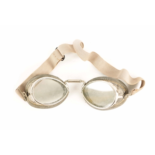 84 - A PAIR OF E.B.MEYROWITZ DRIVING GOGGLES with pivoting nose joints and cushioned cheek pads marked 'L... 