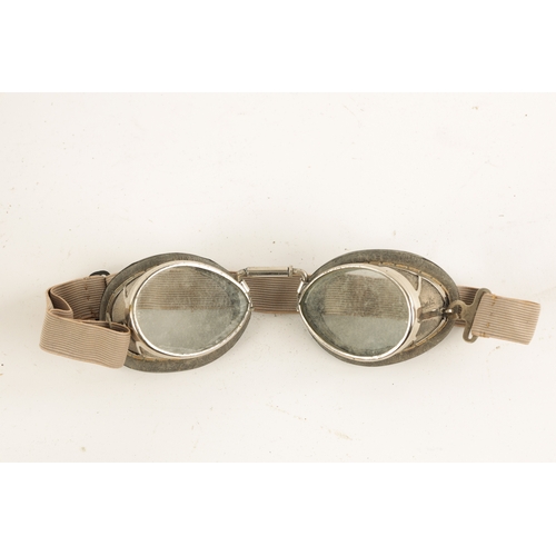 84 - A PAIR OF E.B.MEYROWITZ DRIVING GOGGLES with pivoting nose joints and cushioned cheek pads marked 'L... 