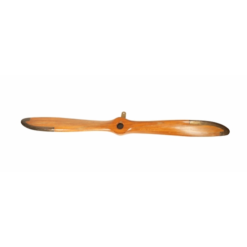 86 - AN EARLY 20TH CENTURY WW1 PROPELLER BLADE with brass tips and shaped blades (281cm overall)