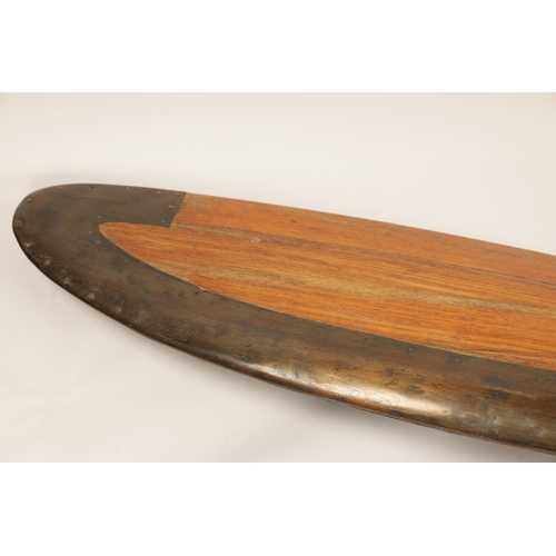 86 - AN EARLY 20TH CENTURY WW1 PROPELLER BLADE with brass tips and shaped blades (281cm overall)