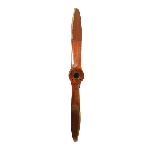 87 - A 1940S LAMINATED MAHOGANY 'CHEETAH X' PROPELLER with metal strap ends - bearing a plaque stamped 'D... 