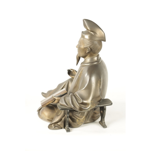 106 - A FINE JAPANESE MEIJI PERIOD BRONZE SCULPTURE depicting a seated scholar; having gold inlaid decorat... 