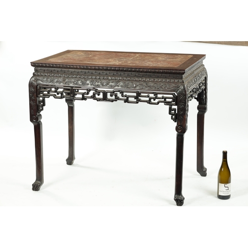 107 - A FINE 19TH CENTURY CHINESE CARVED HARDWOOD CENTRE TABLE the plain rectangular top enclosing a stria... 