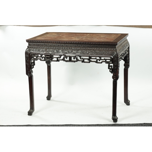 107 - A FINE 19TH CENTURY CHINESE CARVED HARDWOOD CENTRE TABLE the plain rectangular top enclosing a stria... 