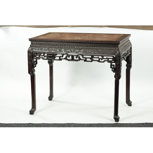 107 - A FINE 19TH CENTURY CHINESE CARVED HARDWOOD CENTRE TABLE the plain rectangular top enclosing a stria... 