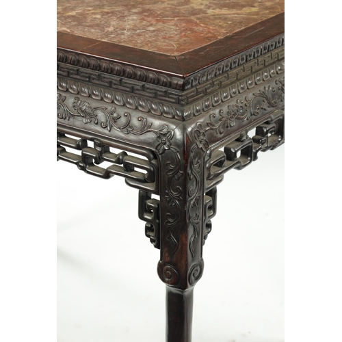 107 - A FINE 19TH CENTURY CHINESE CARVED HARDWOOD CENTRE TABLE the plain rectangular top enclosing a stria... 