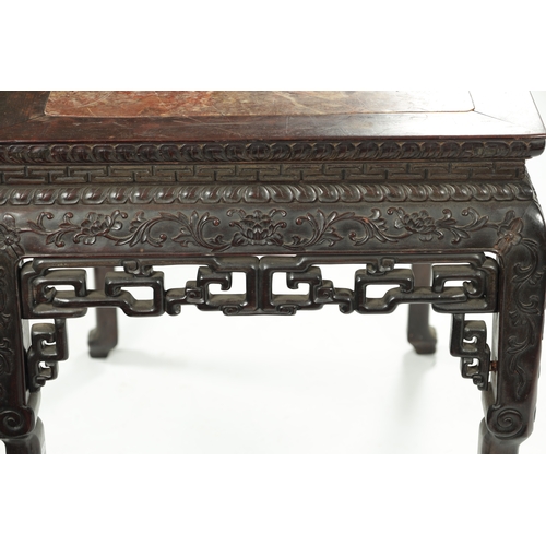 107 - A FINE 19TH CENTURY CHINESE CARVED HARDWOOD CENTRE TABLE the plain rectangular top enclosing a stria... 