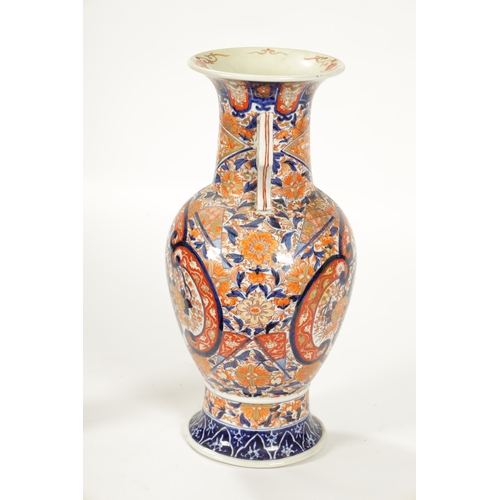 109 - A LARGE 19TH CENTURY IMARI BULBOUS VASE with polychrome coloured body and shaped side handles (54.5c... 