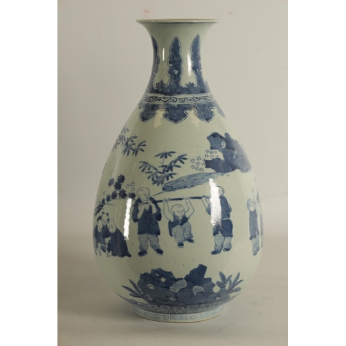 111 - A CHINESE BLUE AND WHITE PORCELAIN VASE of pear shape form decorated with boys playing in a garden l... 