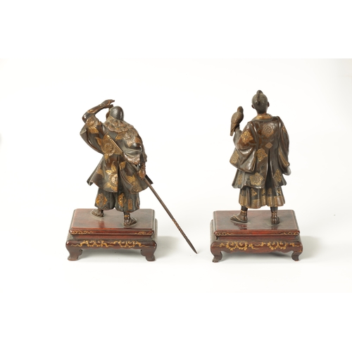 120 - A FINE QUALITY PAIR OF JAPANESE MEIJI PERIOD PATINATED BRONZE AND GILT SCULPTURES BY MIYAO modelled ... 