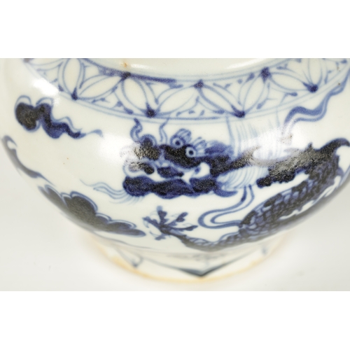 123 - A CHINESE BLUE AND WHITE SHOULDERED VASE OF MING DESIGN with dragon and cloud decoration to the body... 